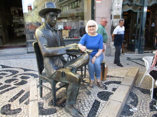 Christine with statue of Fernando Pessoa, Portuguese poet, Lisbon